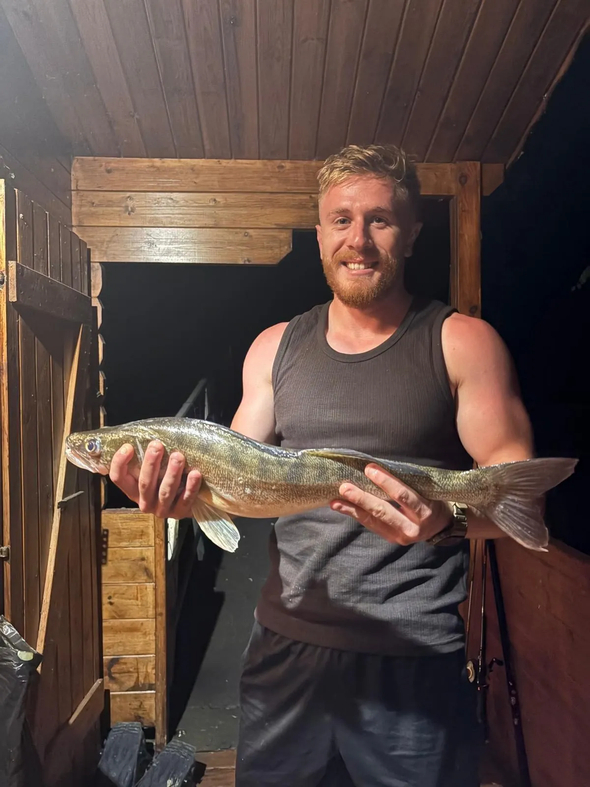 Zander caught at night from the terrace of a floating chalet, Domaine du Dahu